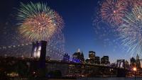 Fireworks above the Brooklyn Bridge and Manhattan skyline.